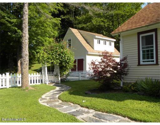 96 Clesson Brook Road Buckland, MA 01339 - Photo 3 of 29 a front view of a house with a yard