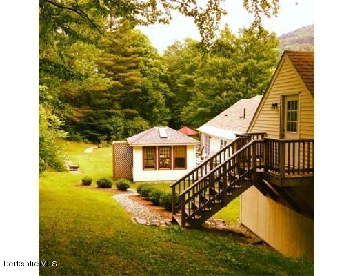 96 Clesson Brook Road Buckland, MA 01339 - Photo 22 of 29 a view of a house with a yard