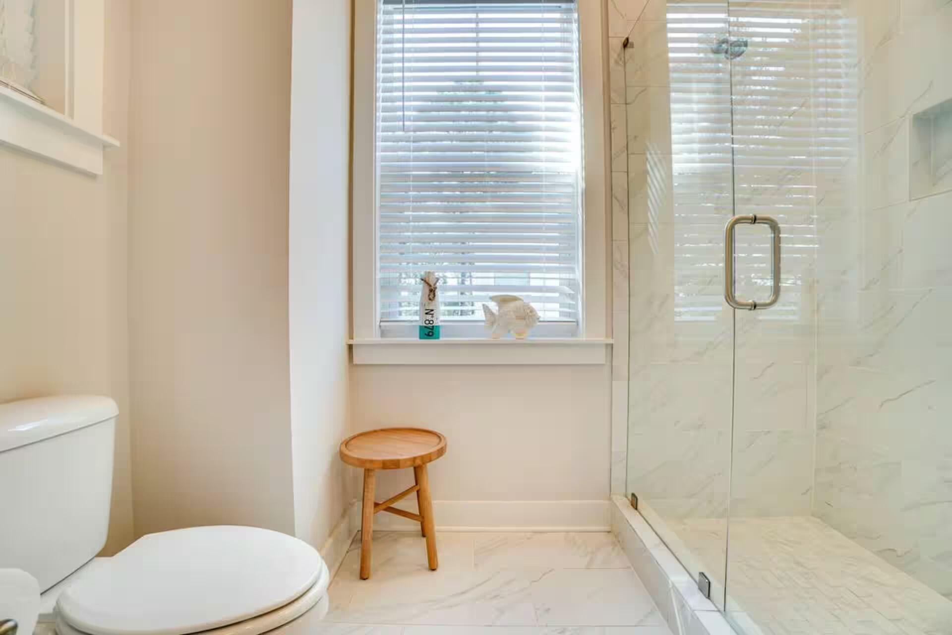 146 East E Pine, Unit B Inlet Beach, FL 32461 - Photo 25 of 47 a white toilet sitting next to a bath tub