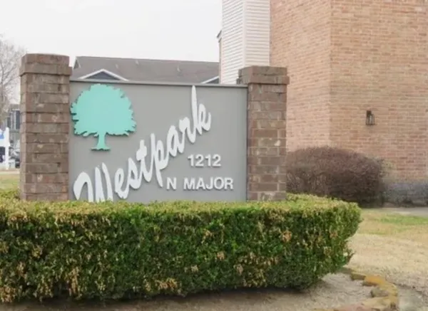 a sign on the side of building