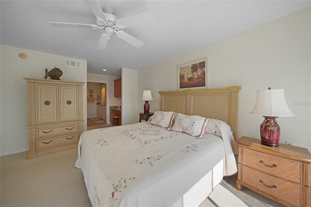 601 Shreve Street, Unit 42C Punta Gorda, FL 33950 - Photo 23 of 39 a bedroom with a bed and a window
