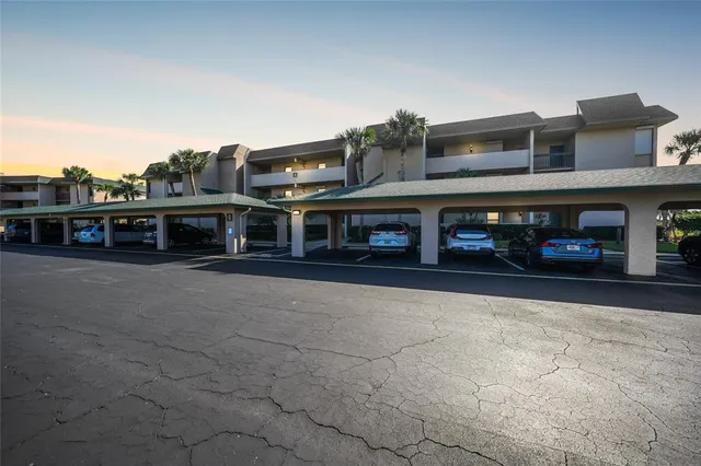 a front view of building with street