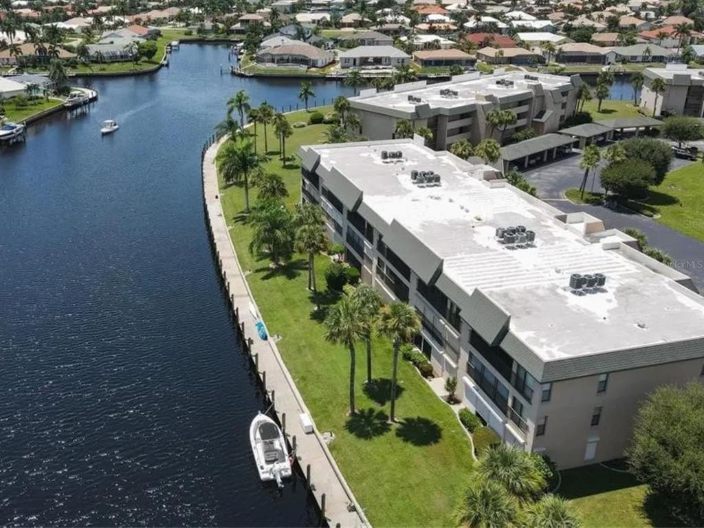601 Shreve Street, Unit 42C Punta Gorda, FL 33950 - Photo 35 of 39 an aerial view of a residential houses with outdoor space