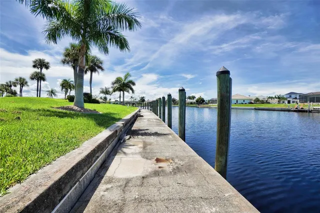 a view of a lake and a yard