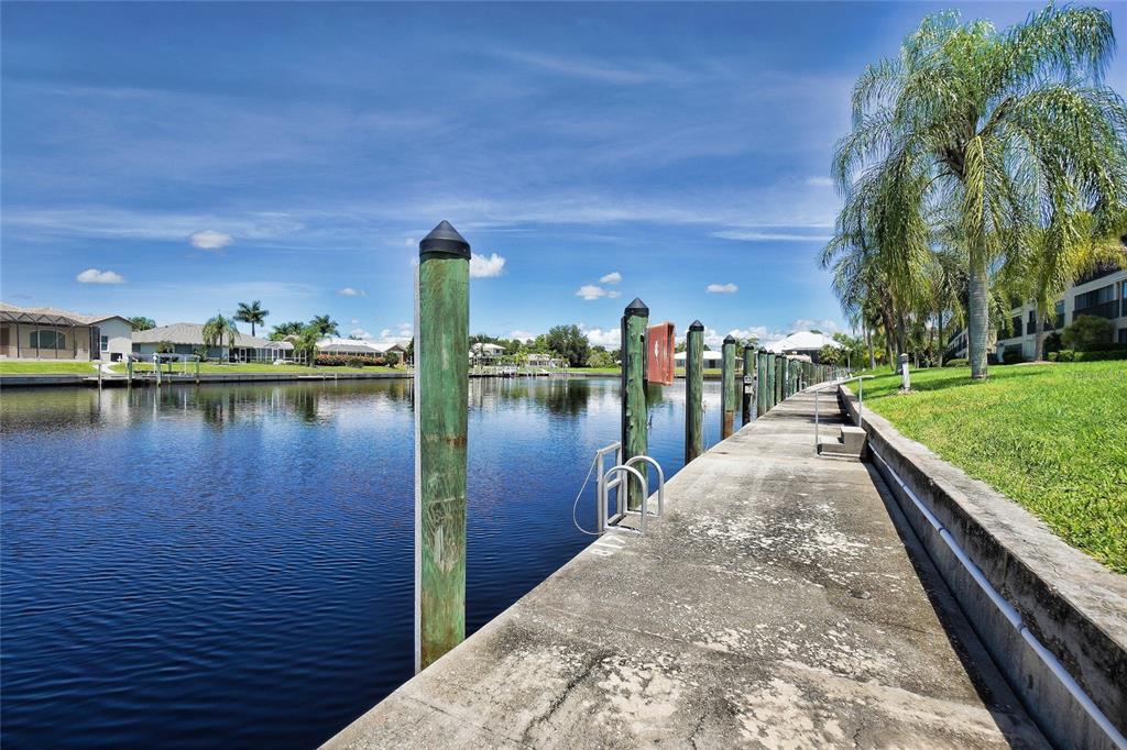 601 Shreve Street, Unit 42C Punta Gorda, FL 33950 - Photo 37 of 39 a view of a lake with a houses