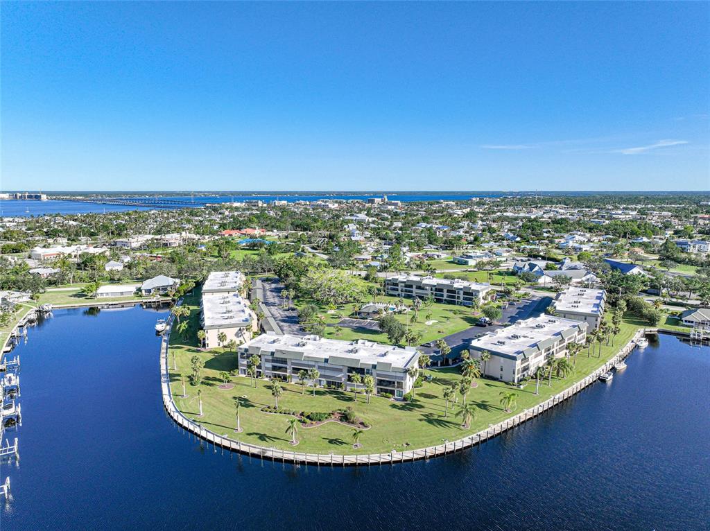 601 Shreve Street, Unit 42C Punta Gorda, FL 33950 - Photo 39 of 39 a view of a swimming pool with a table and chairs
