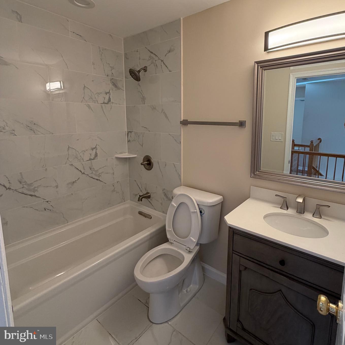 13952 Bishops Bequest Road Upper Marlboro, MD 20772 - Photo 15 of 28 a bathroom with a sink toilet and shower