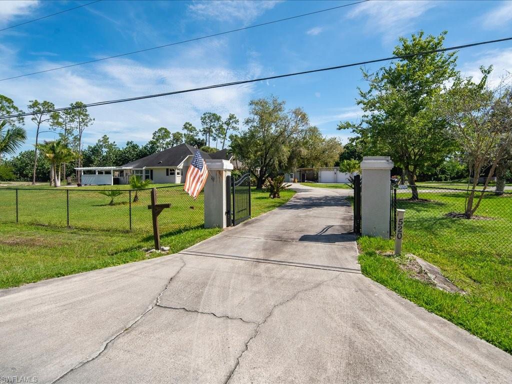 520 Soll Street Naples, FL 34109 - Photo 17 of 31 a view of a park with large trees