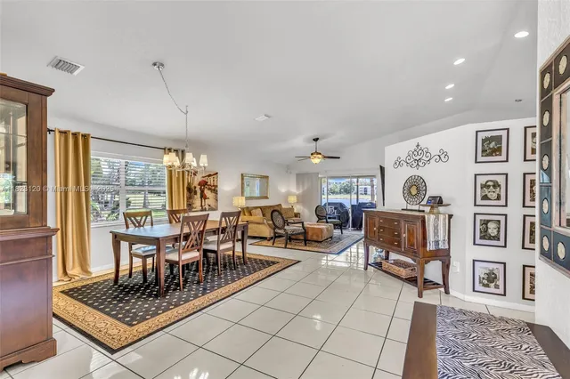 a very nice looking living room with a large window