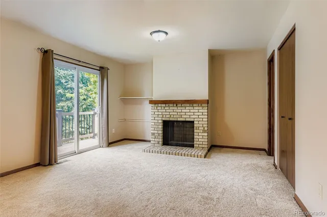 a bathroom with a double vanity sink toilet and mirror