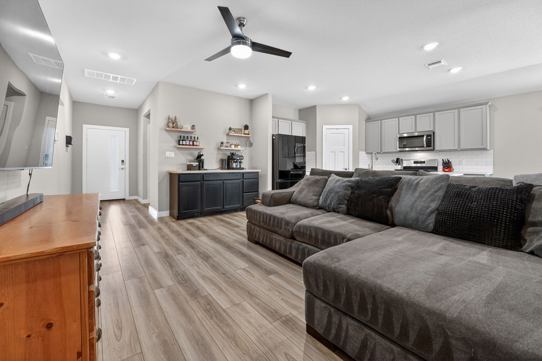 117 Halford Road Georgetown, TX 78633 - Photo 5 of 31 Living room with a ceiling fan, light wood finished floors, and recessed lighting