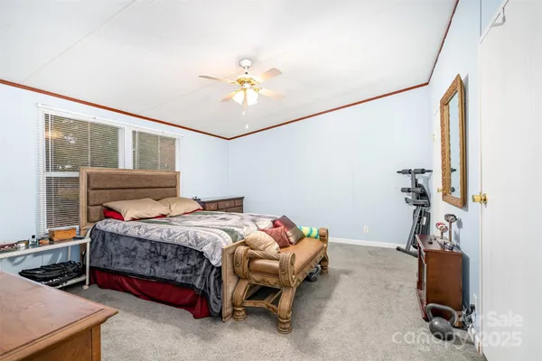 a bathroom with a bathtub double sink and mirror