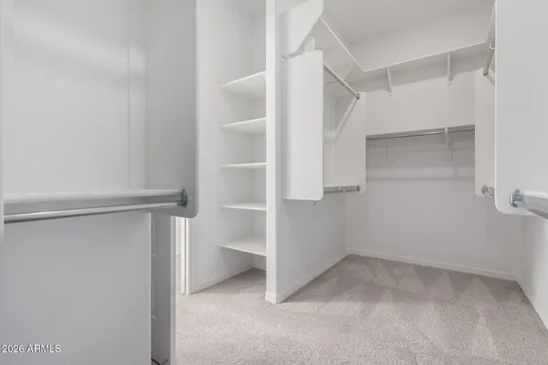 a view of an empty walk in closet