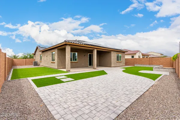 a view of a backyard with a garden