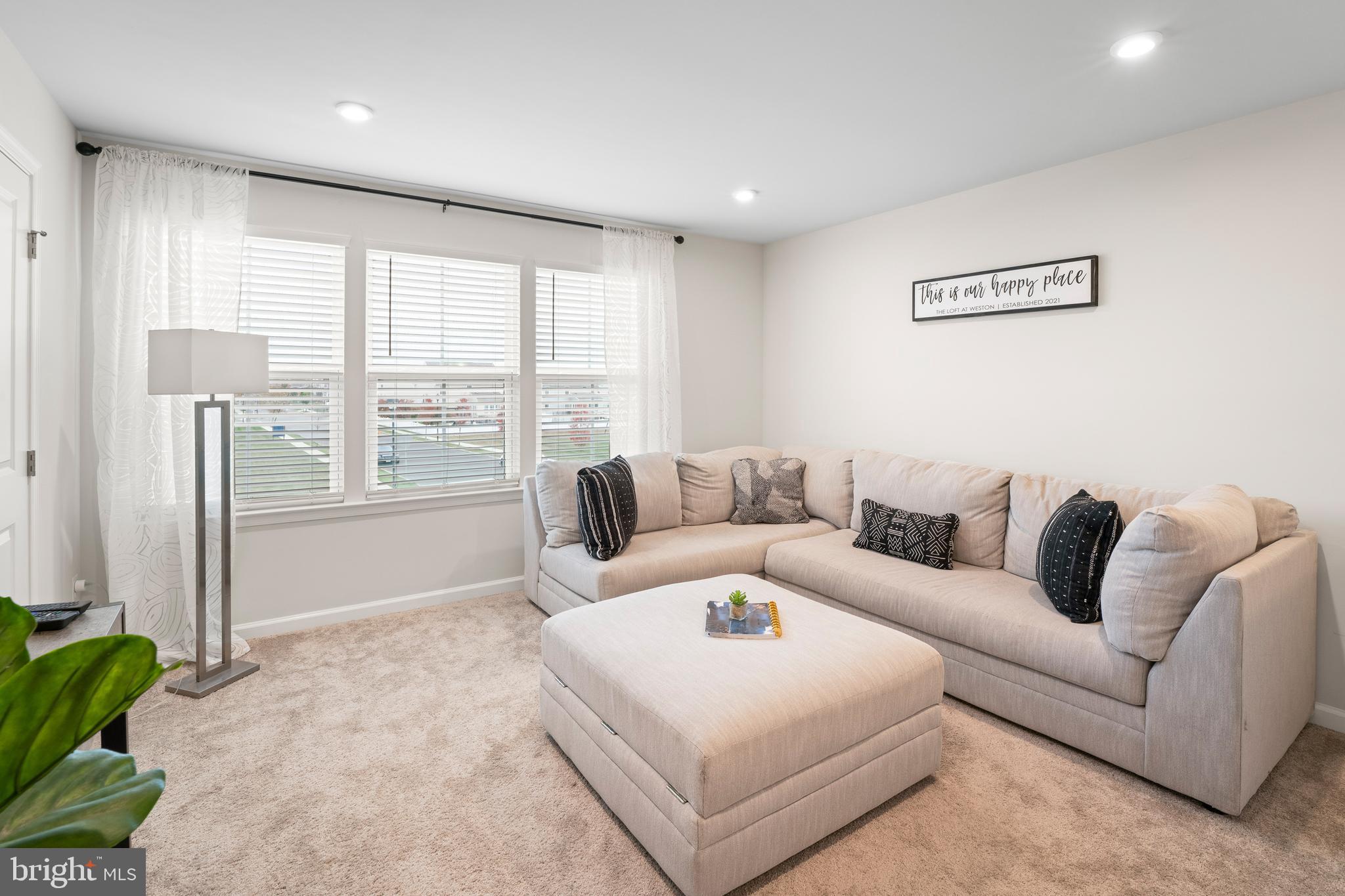 201 Weston Drive Swedesboro, NJ 08085 - Photo 21 of 31 a living room with furniture and a large window