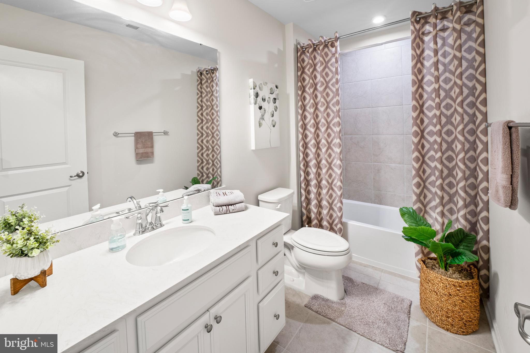 201 Weston Drive Swedesboro, NJ 08085 - Photo 23 of 31 a bathroom with a sink a toilet and shower