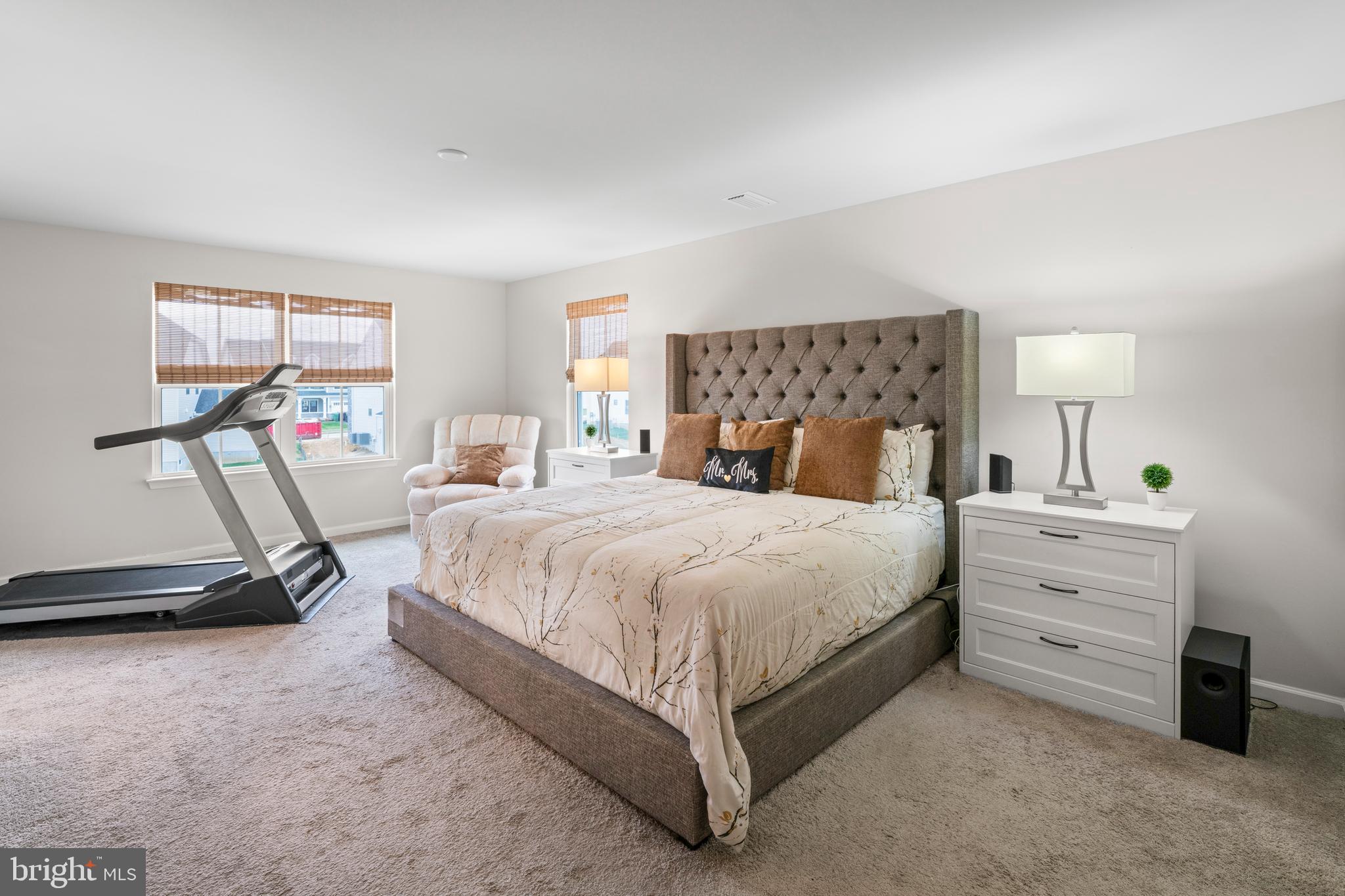 201 Weston Drive Swedesboro, NJ 08085 - Photo 4 of 31 a bedroom with a bed and a flat tv screen on dresser
