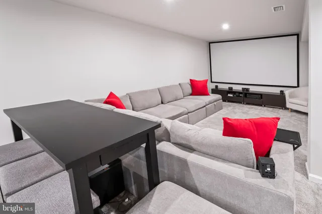 a living room with a couch and a flat screen tv