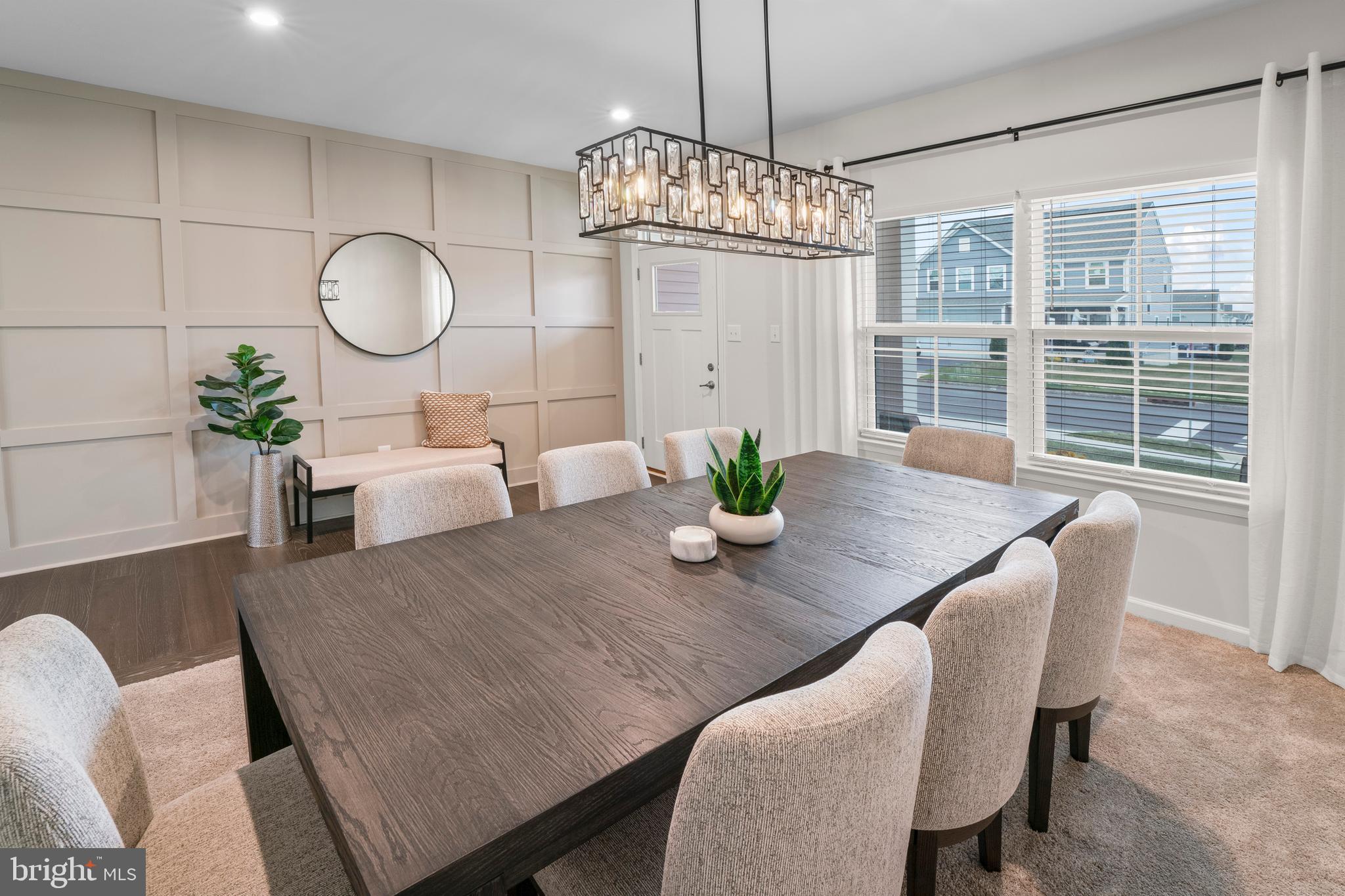 201 Weston Drive Swedesboro, NJ 08085 - Photo 9 of 31 a view of a dining room with furniture a chandelier and wooden floor