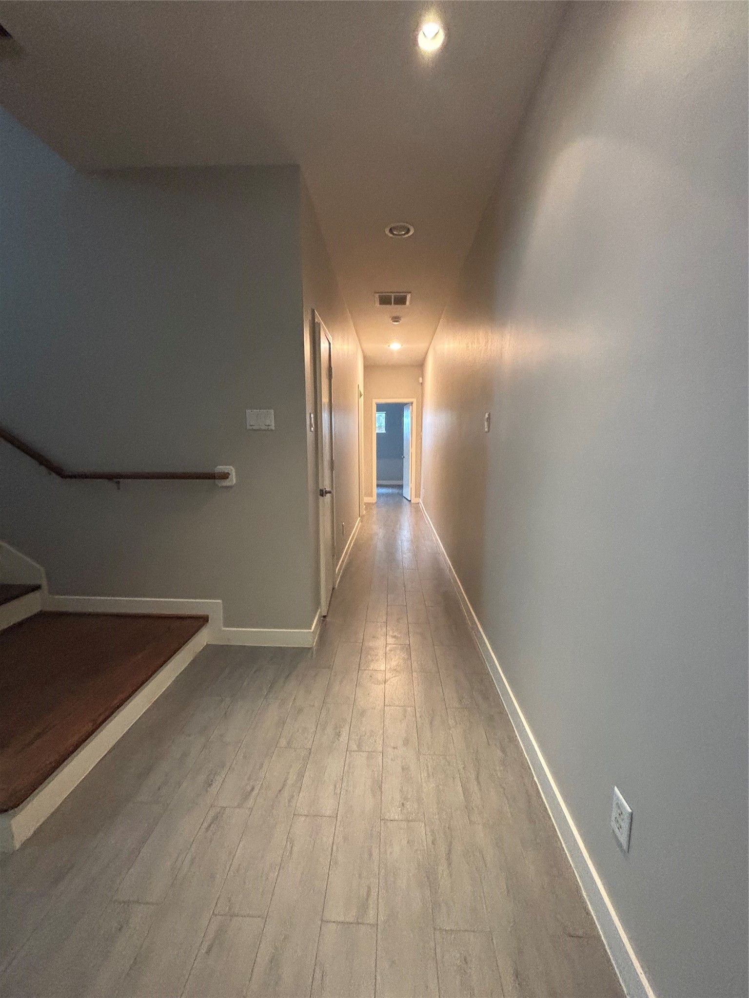 6016 Truro Street Houston, TX 77007 - Photo 22 of 26 Convenient first-floor foyer leading to two secondary bedrooms, a full bath, and the private backyard