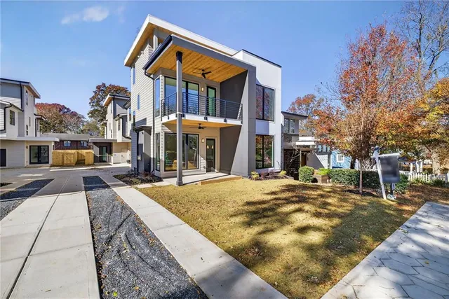a view of a house with brick walls