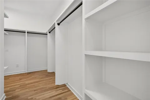 a view of an empty walk in closet
