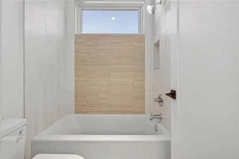 a bathroom with a bathtub