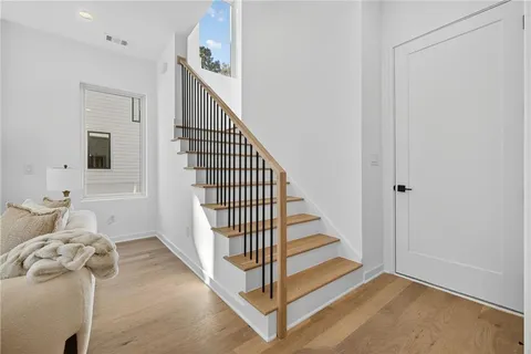 a view of a hallway with staircase