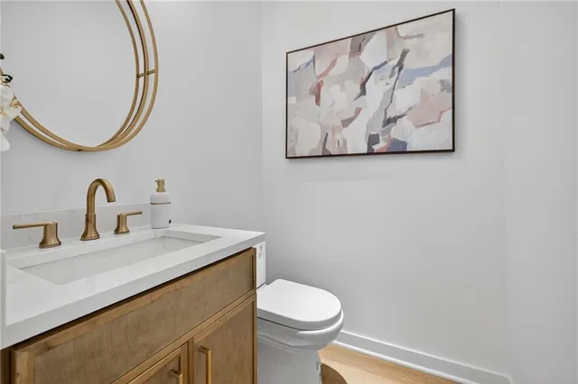 a bathroom with a toilet and a sink