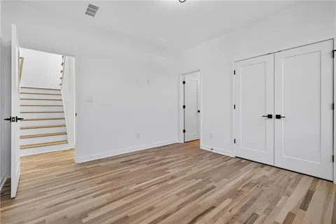 a view of room with hardwood floor