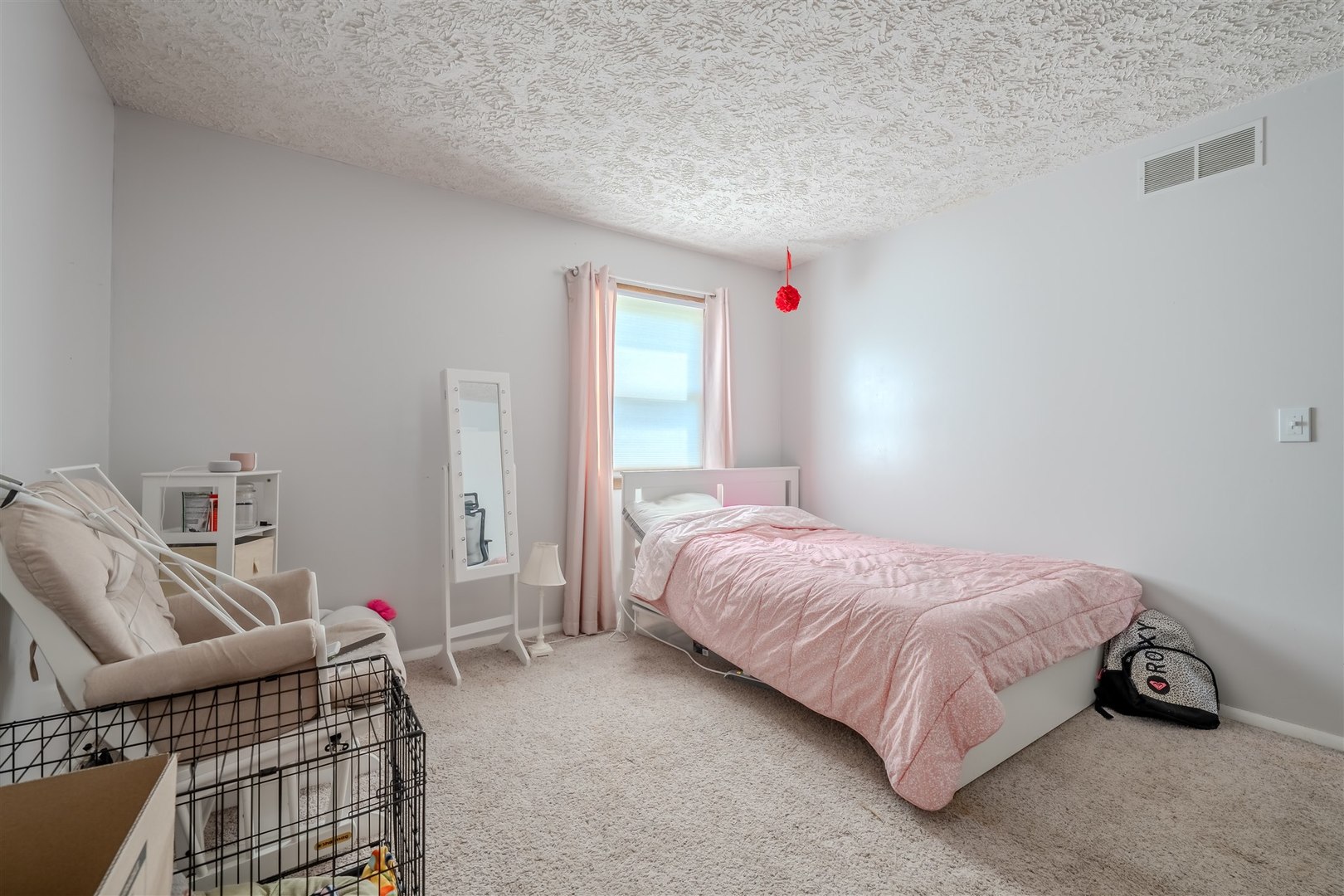 1704 Braden Drive Normal, IL 61761 - Photo 12 of 31 a bedroom with a bed and a window