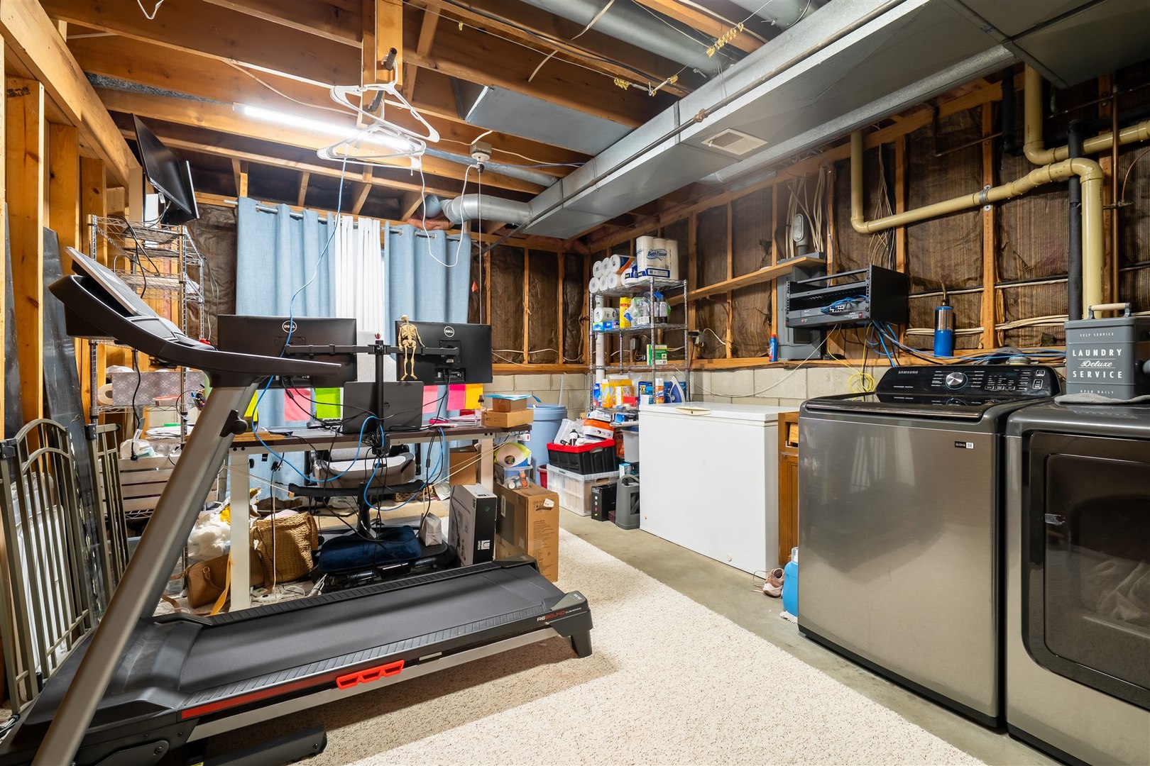 1704 Braden Drive Normal, IL 61761 - Photo 23 of 31 a view of a storage room with furniture washer and dryer