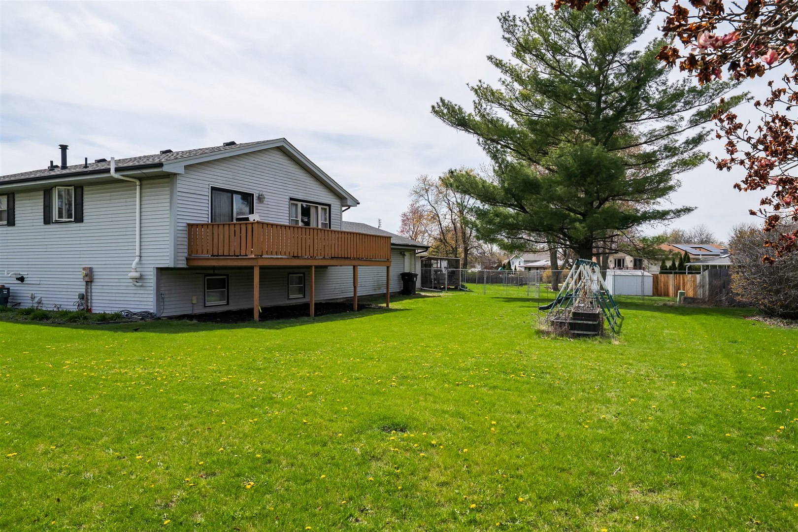 1704 Braden Drive Normal, IL 61761 - Photo 30 of 31 a view of a house with backyard sitting area and garden