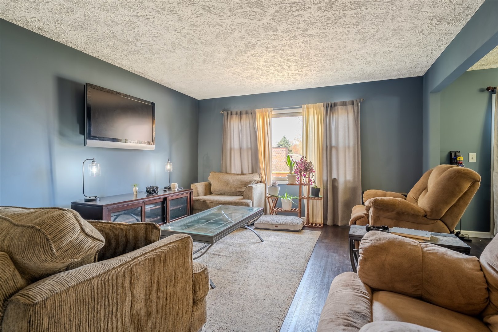 1704 Braden Drive Normal, IL 61761 - Photo 5 of 31 a living room with furniture and a flat screen tv