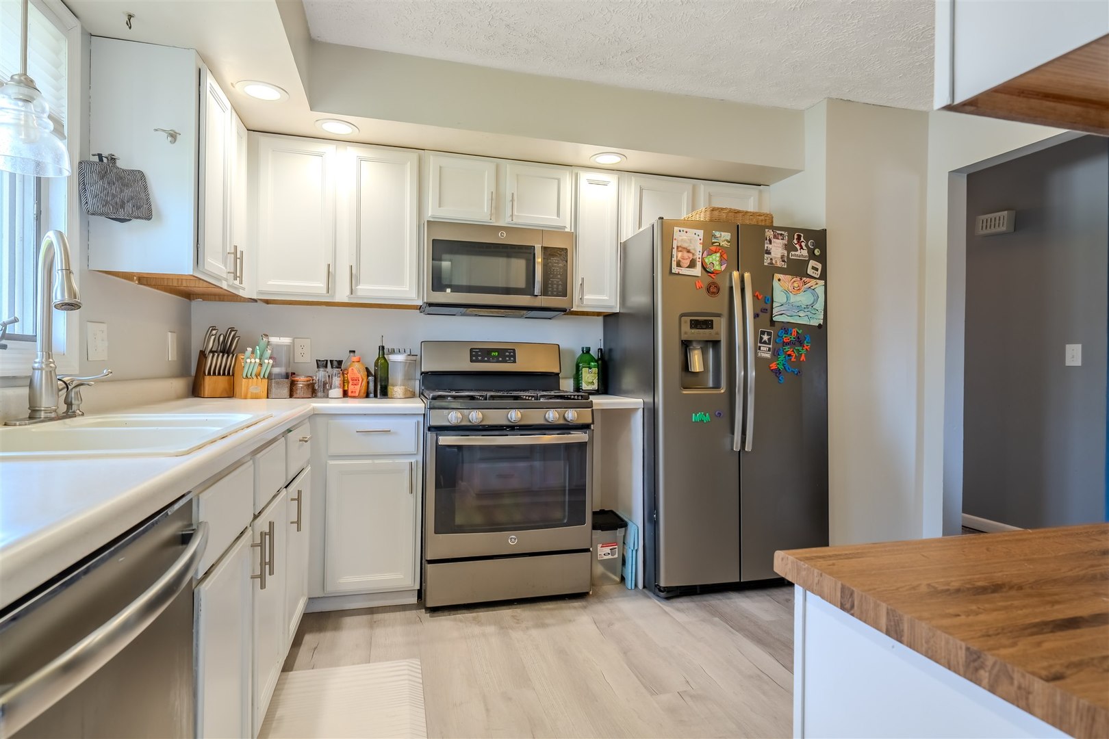 1704 Braden Drive Normal, IL 61761 - Photo 9 of 31 a kitchen with stainless steel appliances granite countertop a refrigerator and a sink