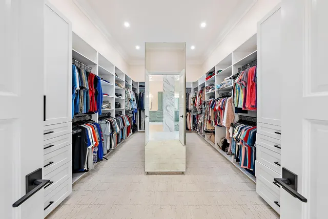 a bathroom with a sink mirror toilet and shower