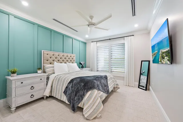 a view of a patio with swimming pool and fire pit