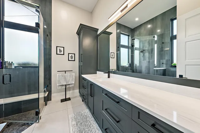 a table and chairs in front of a house