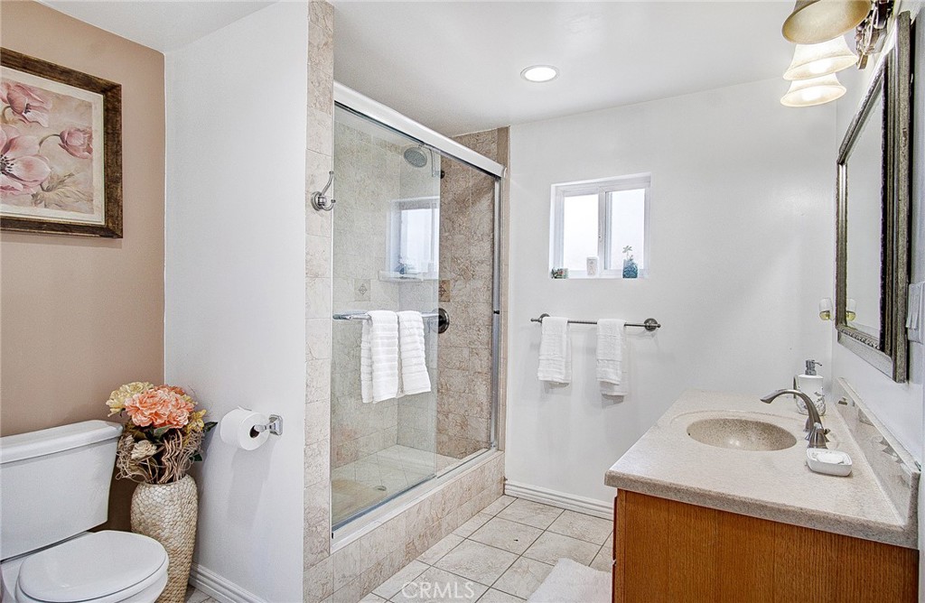 18329 Ambler Avenue Carson, CA 90746 - Photo 17 of 33 a bathroom with a sink toilet and shower
