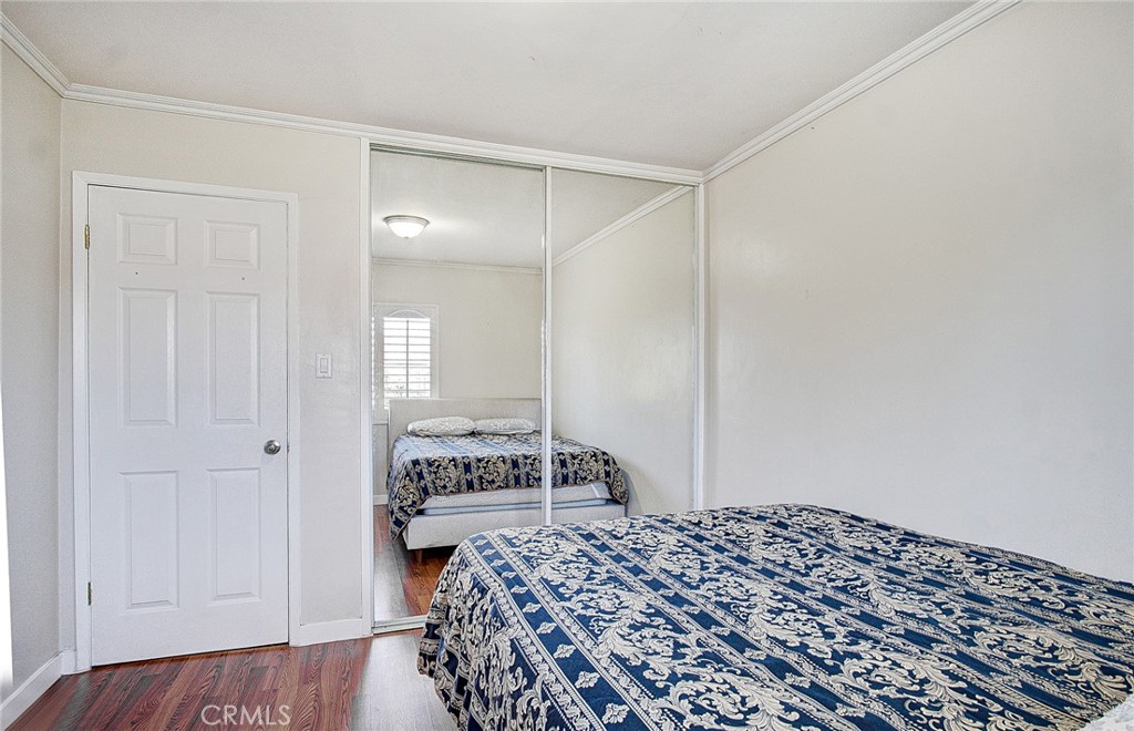 18329 Ambler Avenue Carson, CA 90746 - Photo 22 of 33 a bedroom with a bed and a window