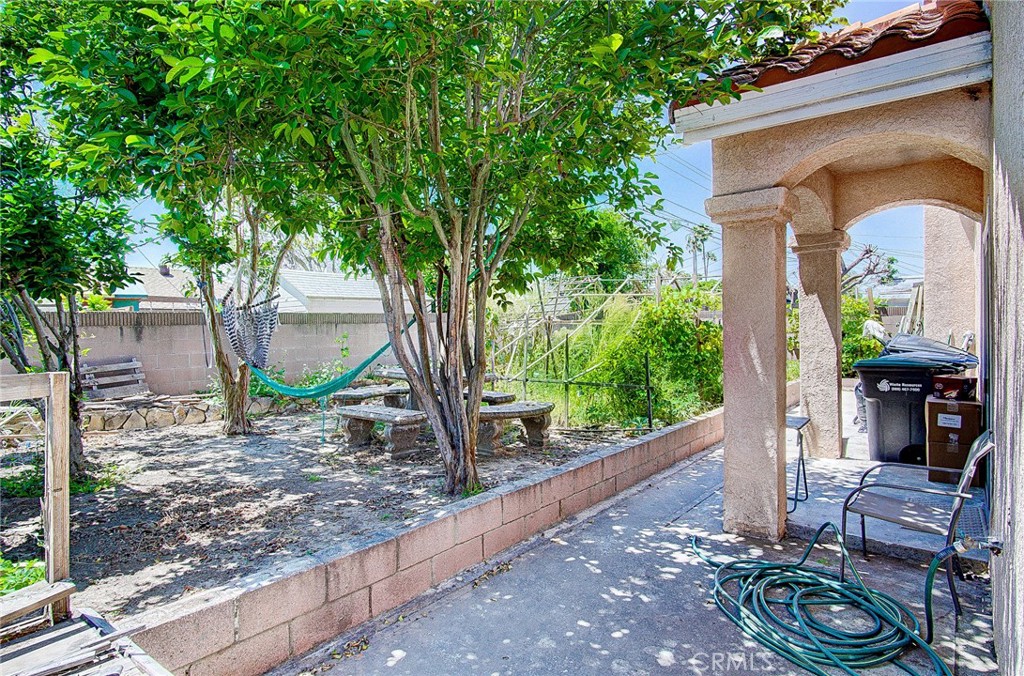 18329 Ambler Avenue Carson, CA 90746 - Photo 25 of 33 a front view of a house with garden