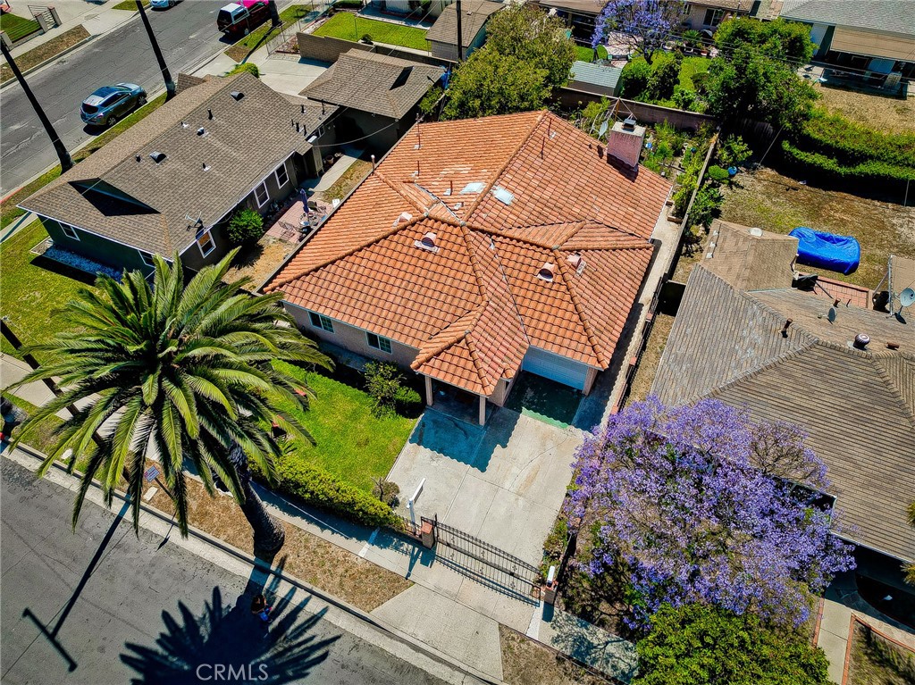 18329 Ambler Avenue Carson, CA 90746 - Photo 28 of 33 an aerial view of a house with a yard and potted plants