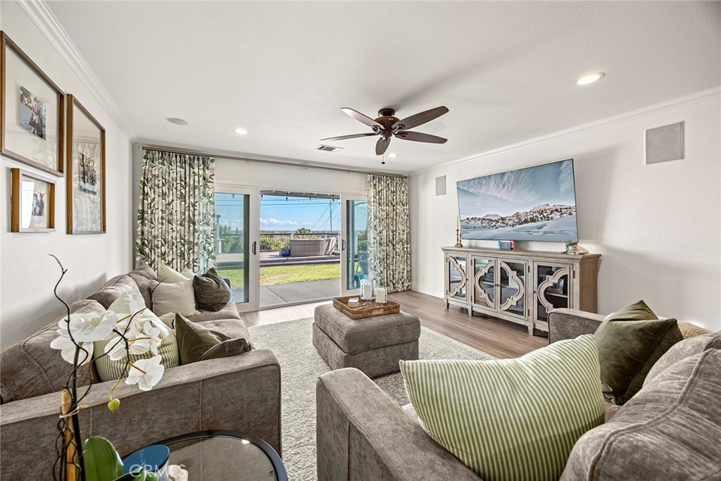 15914 West Road Whittier, CA 90603 - Photo 9 of 47 a living room with furniture ceiling fan and a rug