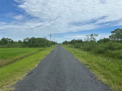 a view of a river and mountains in the background