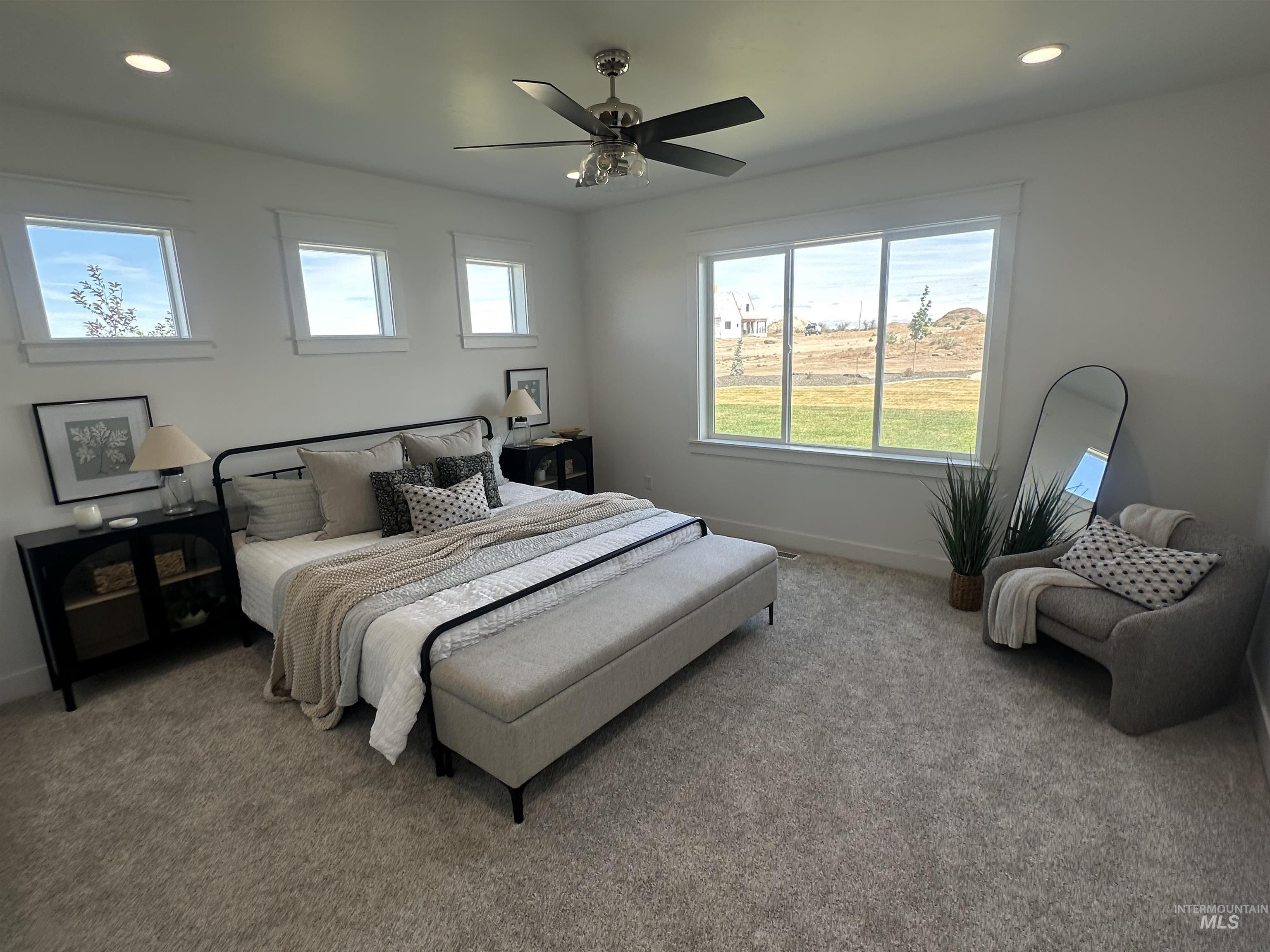 3035 Lake View Twin Falls, ID 83301 - Photo 21 of 41 Dedicated room featuring soft gray carpeting, a large multipane window, and crisp white walls