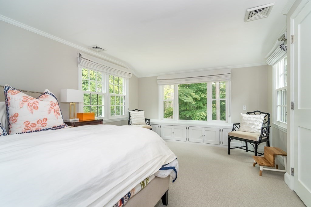 81 Parker Road Wellesley, MA 02482 - Photo 18 of 25 a bedroom with a bed and a window