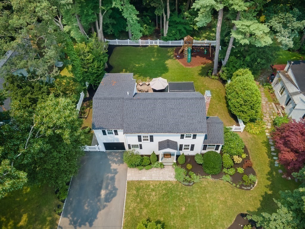 81 Parker Road Wellesley, MA 02482 - Photo 25 of 25 an aerial view of a house with outdoor space swimming pool and outdoor seating