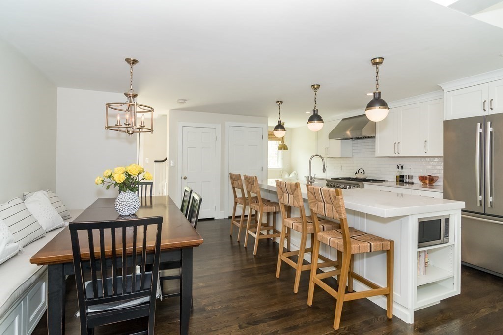 81 Parker Road Wellesley, MA 02482 - Photo 5 of 25 a view of a dining room with furniture window and wooden floor