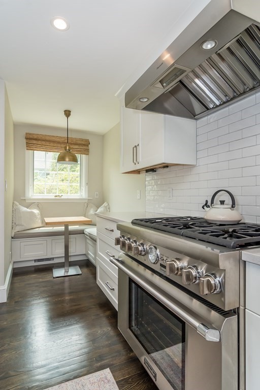 81 Parker Road Wellesley, MA 02482 - Photo 6 of 25 a kitchen with a stove and a wooden floor