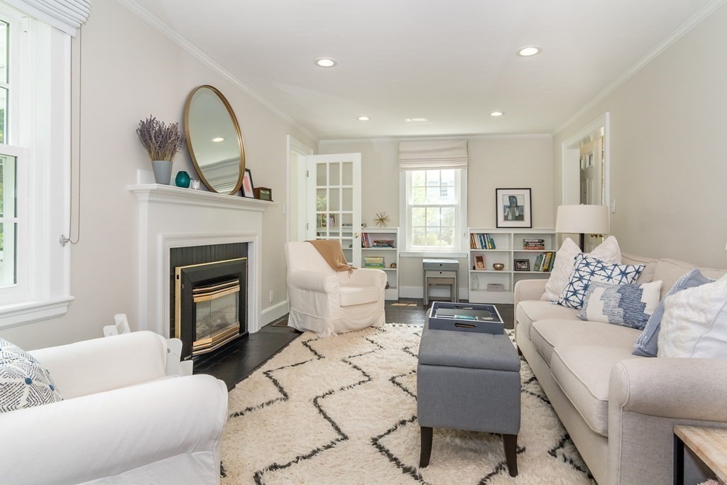 81 Parker Road Wellesley, MA 02482 - Photo 8 of 25 a living room with furniture and a fireplace